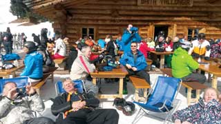 Delegates relax after lunch in one of the many excellent mountain restaurants.