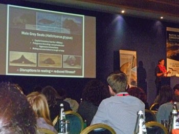 The audience listens to a talk on grey seal reproductive behaviour.