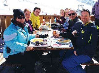 Speakers Martin Whiting and Clive Elwood join delegates and guests for lunch on the slopes.