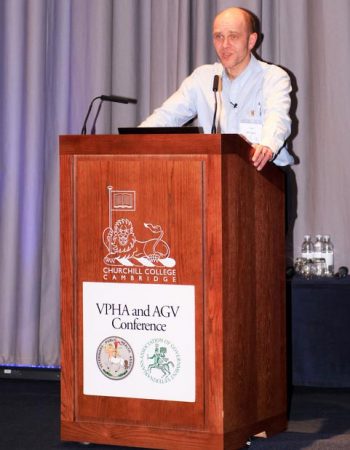 Figure 4. The author speaking at the Veterinary Public Health Association and the Association of Government Veterinarians spring conference.
