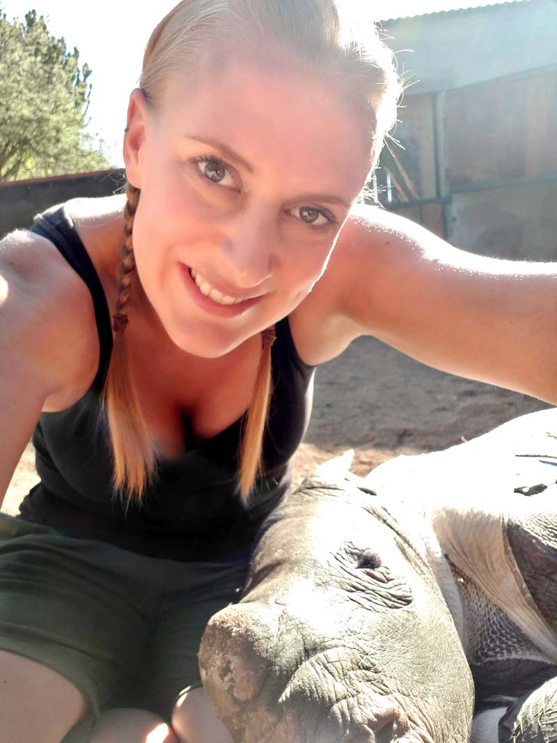Sally Bartlett with Arthur the rhino.