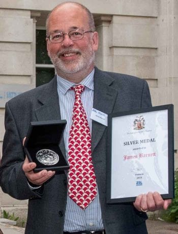 James Barnett receives the ZSL Silver Medal. Image: Zoological Society of London.