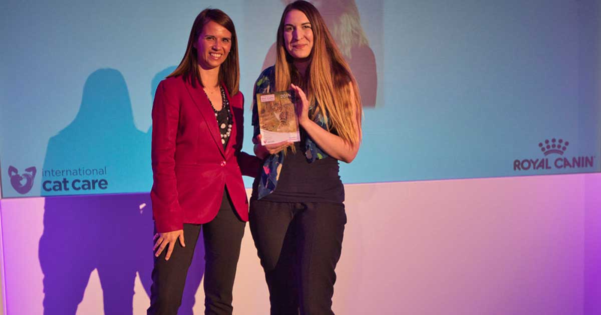 Laura Rosewell (right) receives her award for best grades for the Diploma in Feline Nursing from Elizabete Capitao of Royal Canin.