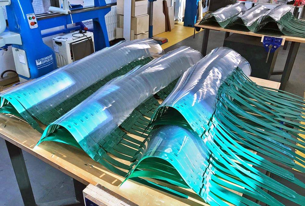 The plastic visors in their production state.