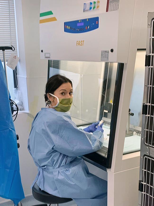 Paragon oncology nurse Dani White prepares a treatment in the cabinet.