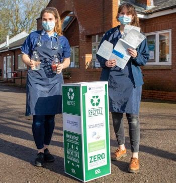 Vets Becky Sedman (left) and Josie Arthur, with a recycling box outside Minster Veterinary Practice, York.