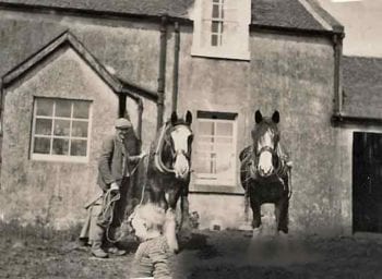 A young Duncan with his father and horses bred by his grandfather