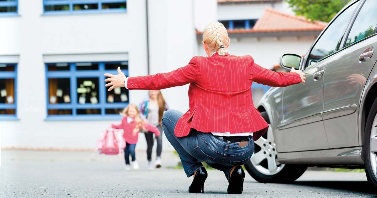 Mum greeting kids.