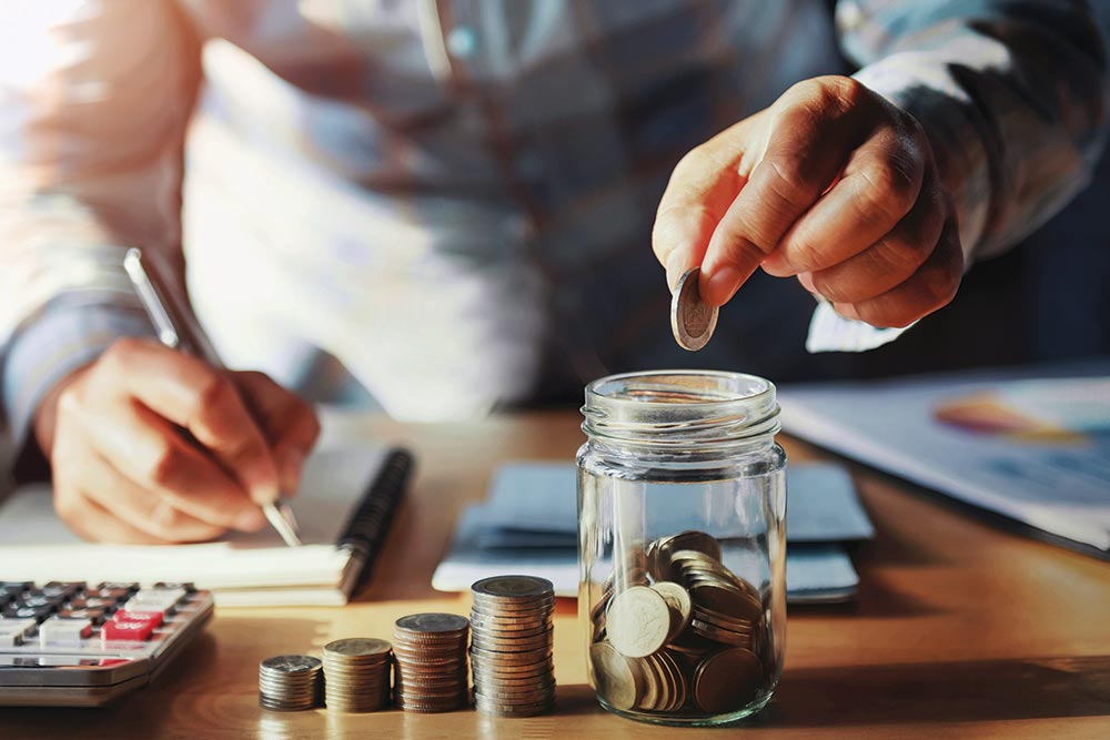 Counting money. Image © lovelyday12 / Adobe Stock