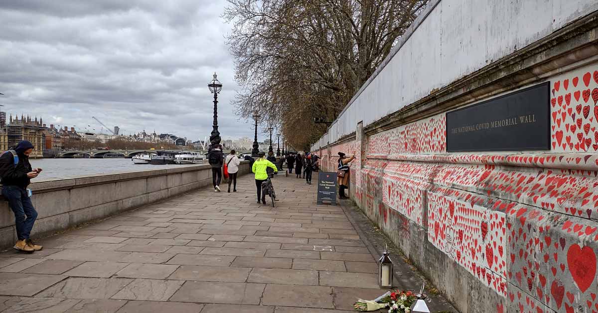 The National COVID Memorial Wall, which stretches for more than a third of a mile along the South Bank of the River Thames in London. Each hand‑painted heart represents one of the more than 150,000 people who have lost their lives to COVID‑19. Dedications for a personalised heart can be made through the Facebook group COVID‑19 Bereaved Families for Justice, which organised the wall.