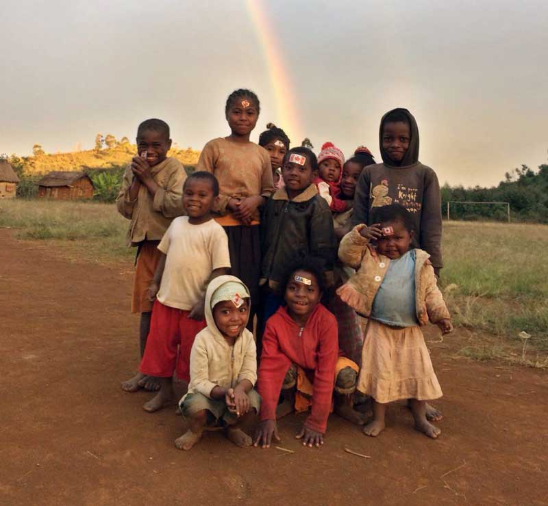 Figure 13. A group of children from Savarina in front of the rainbow.