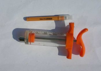 A non-disposable syringe.
