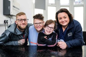 Kim Taylor-Morton, from-Grange-Vets, with Maisie (10) and her parents Shane and Hayley Harris. Image: Grange Vets