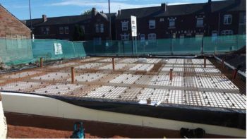 A concrete-free foundation, or passiv slab, being laid for the UK’s first Passivhaus vet surgery. The polystyrene base is structural and provides high levels of insulation.